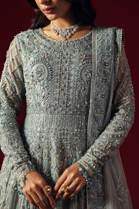 Close-up of Satayesh aqua gown’s sleeve embroidery and structured adda work on bodice